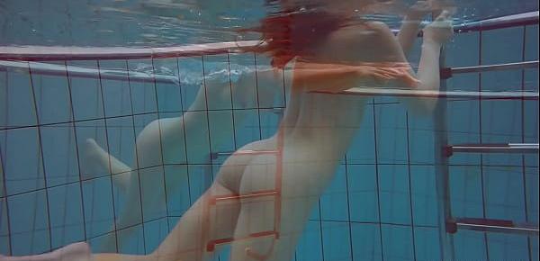  Big tits petite babe Deniska swimming in the pool